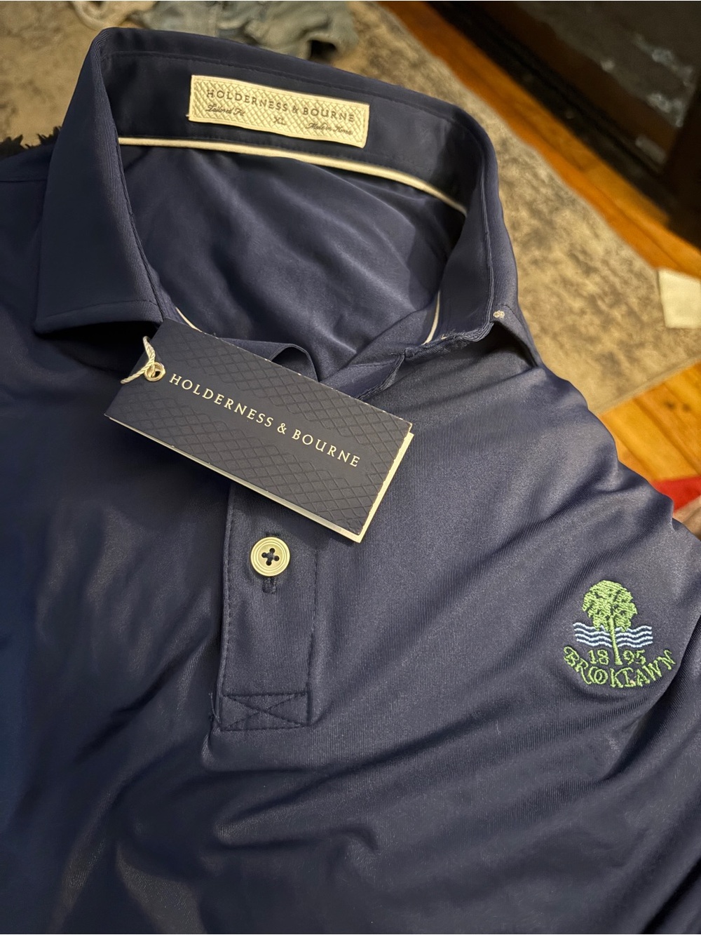Men's Polo Shirt in Deep Blue with Subtle Embroidered Emblem - Picture 2 of 3
